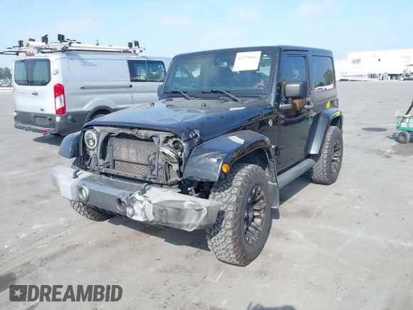 ✅ 2015 Jeep Wrangler Sport • VIN: 1C4AJWAG1FL594007 • Lot: 43779956. Listed on IAAI with 170,911 mi. Free auction sales archive from the USA and detailed vehicle history report at DreamBid. Image 2.