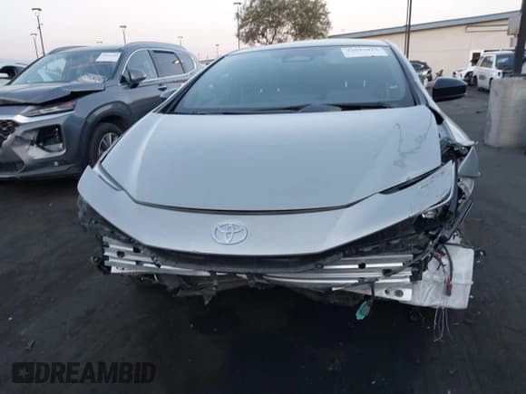 ✅ 2024 Toyota Prius LE • VIN: JTDACAAU2R3021334 • Lot: 43043015. Wystawiony na IAAI z przebiegiem 21 899 mil. Bezpłatny archiwum sprzedaży aukcyjnych z USA i szczegółowy raport historii pojazdu na DreamBid. Zdjęcie 13.