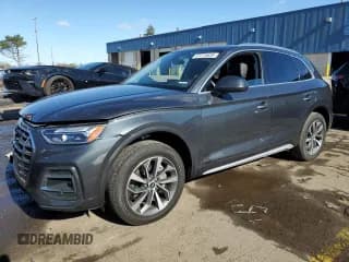 ✅ 2021 Audi Q5 Premium Plus • VIN: WA1BAAFY2M2066918 • Lot: 87375635. Wystawiony na Copart z przebiegiem 58 749 mil. Bezpłatny archiwum sprzedaży aukcyjnych z USA i szczegółowy raport historii pojazdu na DreamBid. Zdjęcie 1.