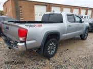 ✅ 2017 Toyota Tacoma SR5 • VIN: 3TMDZ5BN9HM013416 • Lot: 43557102. Listed on IAAI with 108,678 mi. Free auction sales archive from the USA and detailed vehicle history report at DreamBid. Image 4.