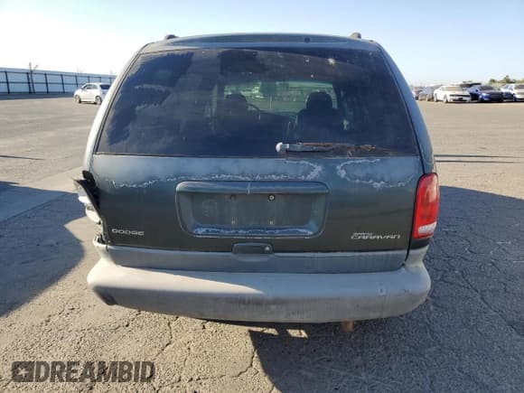✅ 2000 Dodge Caravan LE • VIN: 1B4GP54L7YB571056 • Lot: 71631365. Listed on Copart with 136,970 mi. Free auction sales archive from the USA and detailed vehicle history report at DreamBid. Image 6.