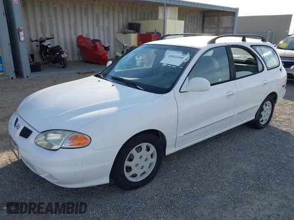 ✅ 2000 Hyundai Elantra • VIN: KMHJW35F0YU158324 • Lot: 43622185. Wystawiony na IAAI z przebiegiem 86 528 mil. Bezpłatny archiwum sprzedaży aukcyjnych z USA i szczegółowy raport historii pojazdu na DreamBid. Zdjęcie 2.