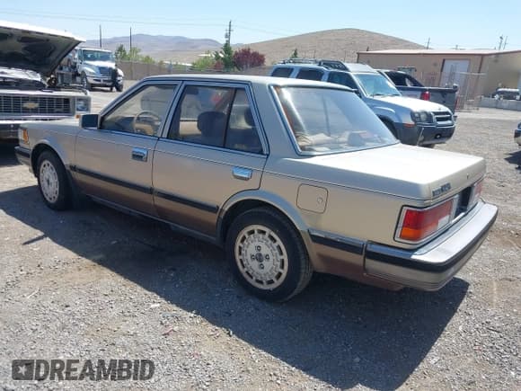 ✅ 1986 Nissan Maxima • VIN: JN1HU11S5GT145169 • Лот: 42472765. Опубликован ранее на IAAI с пробегом 173 183 миль. Бесплатный доступ к архиву аукционных продаж из США и подробный отчёт об истории автомобиля на DreamBid. Изображение 3.