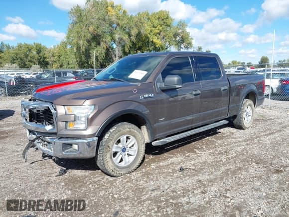 ✅ 2015 Ford F-150 Lariat • VIN: 1FTFW1EG8FKD09927 • Lot: 43373363. Listed on IAAI with 151,038 mi. Free auction sales archive from the USA and detailed vehicle history report at DreamBid. Image 18.