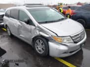 ✅ 2012 Honda Odyssey EX-L • VIN: 5FNRL5H61CB030022 • Lot: 43730404. Listed on IAAI with 153,349 mi. Free auction sales archive from the USA and detailed vehicle history report at DreamBid. Image 1.