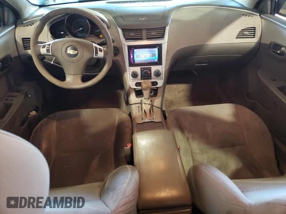 ✅ 2012 Chevrolet Malibu 1LS • VIN: 1G1ZB5E0XCF102133 • Lot: 70023344. Listed on Copart with 196,770 mi. Free auction sales archive from the USA and detailed vehicle history report at DreamBid. Image 8.