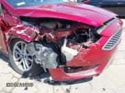 ✅ 2015 Ford Focus SE • VIN: 1FADP3F27FL300543 • Lot: 42228251. Listed on IAAI with 141,233 mi. Free auction sales archive from the USA and detailed vehicle history report at DreamBid. Image 6.