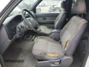 ✅ 1999 Toyota Tacoma • VIN: 4TAVL52N3XZ523937 • Lot: 66933295. Listed on Copart with 284,029 mi. Free auction sales archive from the USA and detailed vehicle history report at DreamBid. Image 7.