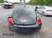 ✅ 2013 Volkswagen Beetle Fender Edition • VIN: 3VWJP7AT6DM687633 • Lot: 42368984. Listed on IAAI with 137,459 mi. Free auction sales archive from the USA and detailed vehicle history report at DreamBid. Image 16.