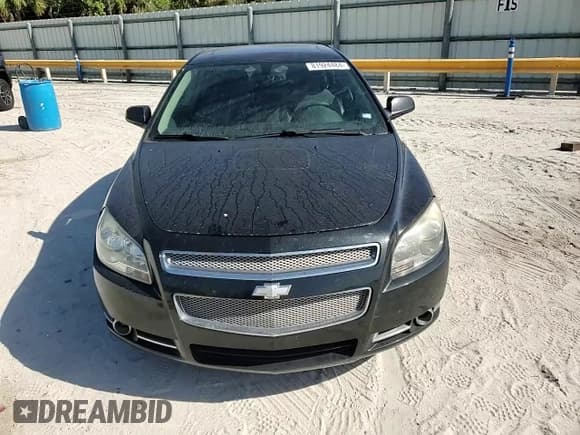 ✅ 2010 Chevrolet Malibu LTZ • VIN: 1G1ZE5E7XA4154536 • Lot: 81924484. Listed on Copart with 213,055 mi. Free auction sales archive from the USA and detailed vehicle history report at DreamBid. Image 11.