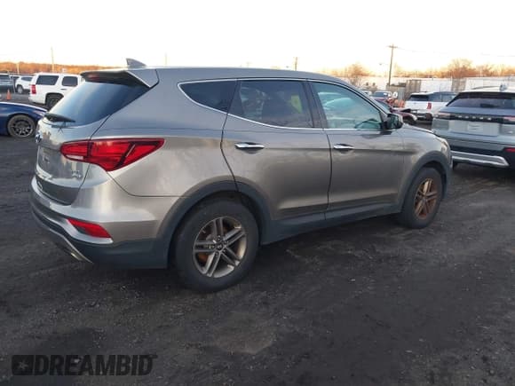 ✅ 2017 Hyundai Santa Fe 2.4L • VIN: 5XYZTDLB0HG396729 • Lot: 43859049. Listed on IAAI with 119,122 mi. Free auction sales archive from the USA and detailed vehicle history report at DreamBid. Image 4.