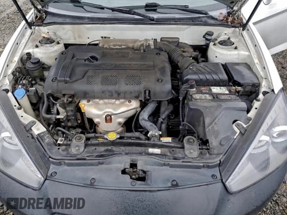 ✅ 2008 Hyundai Tiburon GS • VIN: KMHHM66DX8U290039 • Лот: 95370315. Опубликован ранее на Copart с пробегом 130 680 миль. Бесплатный доступ к архиву аукционных продаж из США и подробный отчёт об истории автомобиля на DreamBid. Изображение 11.