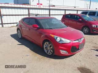 2012 Hyundai Veloster w/Gray Int with VIN KMHTC6AD1CU051606, listed as a IAAI auction lot 43436964 with 144,149 mi miles and . Bid and sale history available at DreamBid. Image 1.