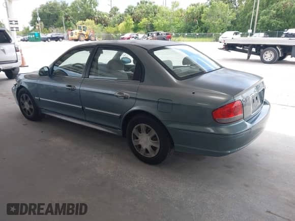 2004 Hyundai Sonata with VIN KMHWF25H64A045393, listed as a IAAI auction lot 42645956 with 114,112 mi miles and . Bid and sale history available at DreamBid. Image 3.