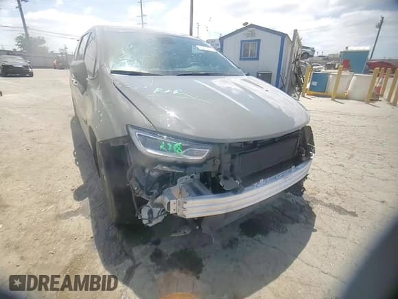 ✅ 2023 Chrysler Pacifica Hybrid Touring L • VIN: 2C4RC1L75PR580133 • Lot: 56873655. Listed on Copart with 31,718 mi. Free auction sales archive from the USA and detailed vehicle history report at DreamBid. Image 15.