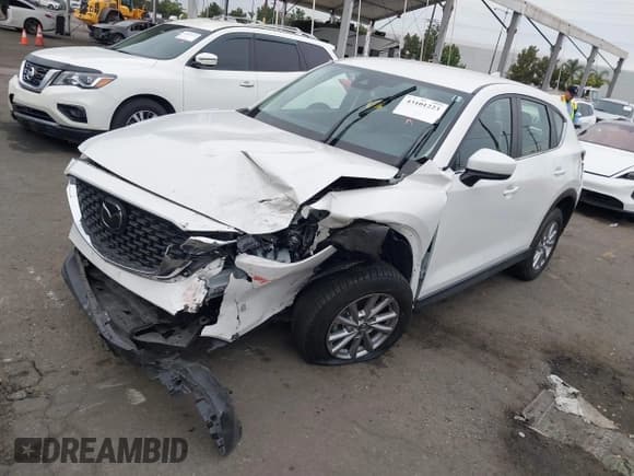✅ 2023 Mazda CX-5 S • VIN: JM3KFBAM5P0159733 • Лот: 43101223. Опубликован ранее на IAAI с пробегом 22 283 миль. Бесплатный доступ к архиву аукционных продаж из США и подробный отчёт об истории автомобиля на DreamBid. Изображение 17.