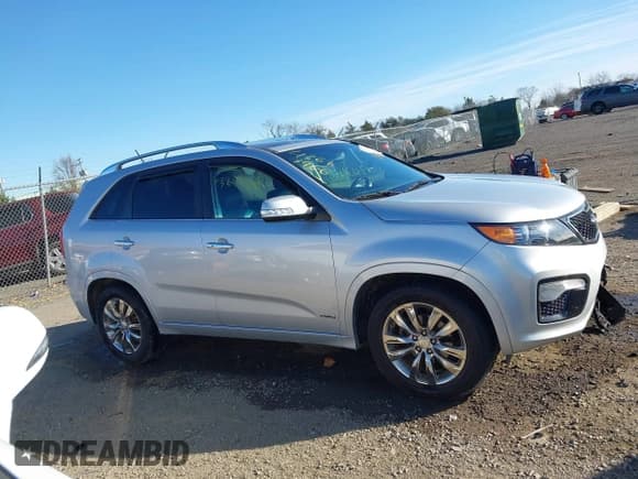 ✅ 2012 Kia Sorento SX • VIN: 5XYKWDA29CG219715 • Lot: 43613966. Listed on IAAI with 244,949 mi. Free auction sales archive from the USA and detailed vehicle history report at DreamBid. Image 13.