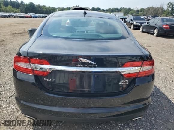 ✅ 2014 Jaguar XF SC • VIN: SAJWJ0EFXE8U21044 • Lot: 70684985. Listed on Copart with 85,325 mi. Free auction sales archive from the USA and detailed vehicle history report at DreamBid. Image 6.