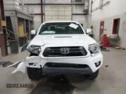 ✅ 2014 Toyota Tacoma • VIN: 3TMLU4EN5EM158285 • Lot: 42583384. Listed on IAAI with 11,353 mi. Free auction sales archive from the USA and detailed vehicle history report at DreamBid. Image 13.