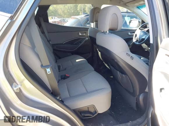 2018 Hyundai Santa Fe 2.4L z VIN 5XYZT3LB7JG556833, wystawiony jako IAAI lot #43456339 z przebiegiem 153 359 mil mil oraz . Historia ofert i sprzedaży dostępna na DreamBid. Obrazek 8.