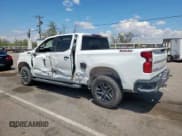 ✅ 2024 Chevrolet Silverado 1500 LT Trail Boss • VIN: 3GCUDFEDXRG243117 • Lot: 69073085. Wystawiony na Copart z przebiegiem 61 981 mil. Bezpłatny archiwum sprzedaży aukcyjnych z USA i szczegółowy raport historii pojazdu na DreamBid. Zdjęcie 2.