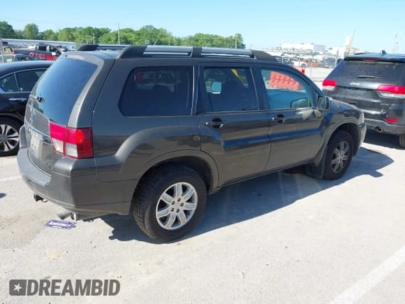 ✅ 2011 Mitsubishi Endeavor LS • VIN: 4A4JN2AS8BE035823 • Лот: 42293080. Опубликован ранее на IAAI с пробегом 145 720 миль. Бесплатный доступ к архиву аукционных продаж из США и подробный отчёт об истории автомобиля на DreamBid. Изображение 4.