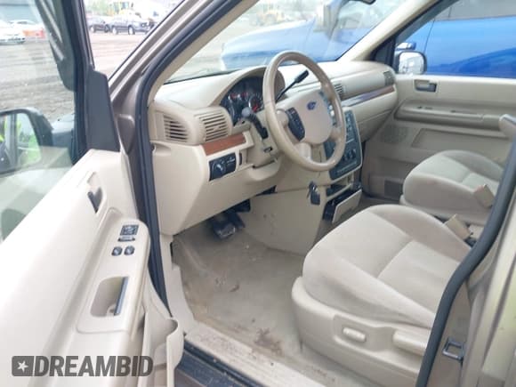 ✅ 2005 Ford Freestar SEL • VIN: 2FMZA52275BA14821 • Lot: 42446043. Listed on IAAI with Not provided. Free auction sales archive from the USA and detailed vehicle history report at DreamBid. Image 5.