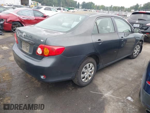 ✅ 2010 Toyota Corolla • VIN: 1NXBU4EEXAZ223869 • Lot: 40414351. Listed on IAAI with 215,219 mi. Free auction sales archive from the USA and detailed vehicle history report at DreamBid. Image 4.