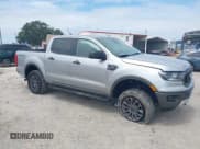 ✅ 2020 Ford Ranger Lariat • VIN: 1FTER4FH9LLA71409 • Lot: 43205180. Listed on IAAI with 41,813 mi. Free auction sales archive from the USA and detailed vehicle history report at DreamBid. Image 1.