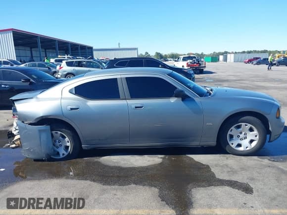 ✅ 2006 Dodge Charger • VIN: 2B3KA43G46H186119 • Лот: 43479641. Опубликован ранее на IAAI с пробегом 214 316 миль. Бесплатный доступ к архиву аукционных продаж из США и подробный отчёт об истории автомобиля на DreamBid. Изображение 14.