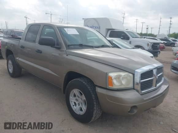 2006 Dodge Dakota SLT with VIN 1D7HE48N16S703072, listed as a IAAI auction lot 42156709 with 102,919 mi miles and . Bid and sale history available at DreamBid. Image 1.