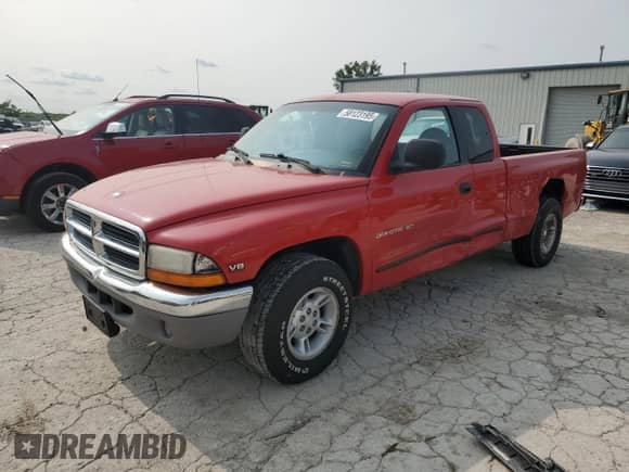 1999 Dodge Dakota SLT z VIN 1B7GL22Y6XS283846, wystawiony jako Copart lot #58123195 z przebiegiem 175 671 mil mil oraz Szkoda całkowita • Salvage title. Historia ofert i sprzedaży dostępna na DreamBid. Obrazek 1.