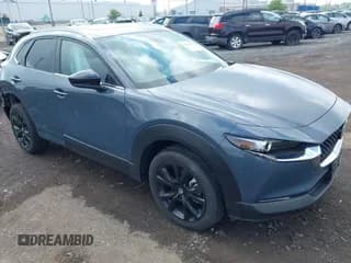 ✅ 2023 Mazda CX-30 S Carbon Edition • VIN: 3MVDMBCM7PM587903 • Lot: 42439069. Listed on IAAI with 1,804 mi. Free auction sales archive from the USA and detailed vehicle history report at DreamBid. Image 1.