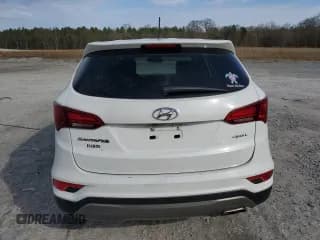 ✅ 2018 Hyundai Santa Fe 2.4L • VIN: 5NMZT3LB9JH052550 • Лот: 40861503. Опубликован ранее на Copart с пробегом 119 191 миль. Бесплатный доступ к архиву аукционных продаж из США и подробный отчёт об истории автомобиля на DreamBid. Изображение 6.