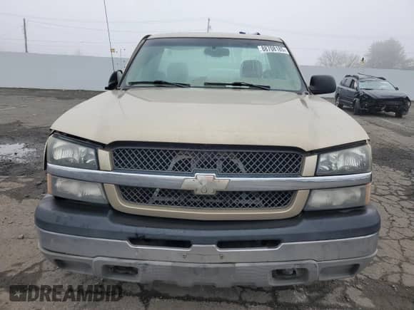 2004 Chevrolet Silverado 1500 LS z VIN 1GCEC14T74E115825, wystawiony jako Copart lot #88708185 z przebiegiem Nie podano mil oraz Szkoda całkowita • Salvage title. Historia ofert i sprzedaży dostępna na DreamBid. Obrazek 5.
