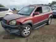 2005 Hyundai Tucson GLS z VIN KM8JN12D05U129525, wystawiony jako Copart lot #79690934 z przebiegiem 169 061 mil mil oraz Szkoda całkowita • Salvage title. Historia ofert i sprzedaży dostępna na DreamBid. Obrazek 1.