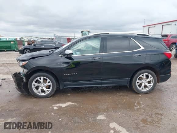 2018 Chevrolet Equinox Premier с VIN 2GNAXVEV8J6262687, выставлен на аукционе IAAI как лот 43275439 с пробегом 159 141 миль миль и . История ставок и продаж доступна на DreamBid. Изображение 14.