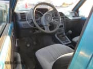 ✅ 1992 Suzuki Sidekick • VIN: 2S3TC01C2N6405497 • Lot: 75856164. Wystawiony na Copart z przebiegiem 38 423 mil. Bezpłatny archiwum sprzedaży aukcyjnych z USA i szczegółowy raport historii pojazdu na DreamBid. Zdjęcie 8.