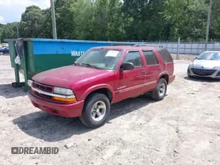 ✅ 2002 Chevrolet Blazer LS • VIN: 1GNCS13W12K137797 • Lot: 42679421. Wystawiony na IAAI z przebiegiem 129 749 mil. Bezpłatny archiwum sprzedaży aukcyjnych z USA i szczegółowy raport historii pojazdu na DreamBid. Zdjęcie 2.