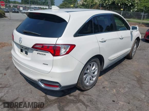 ✅ 2017 Acura RDX • VIN: 5J8TB4H32HL005922 • Lot: 42680888. Listed on IAAI with 104,457 mi. Free auction sales archive from the USA and detailed vehicle history report at DreamBid. Image 4.