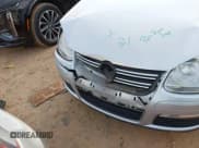 ✅ 2009 Volkswagen Jetta S • VIN: 3VWJM71KX9M097779 • Lot: 43749490. Listed on IAAI with 75,266 mi. Free auction sales archive from the USA and detailed vehicle history report at DreamBid. Image 6.