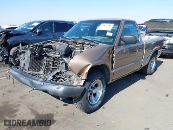 ✅ 2003 Chevrolet S-10 LS • VIN: 1GCCS14H338107286 • Лот: 41467985. Опубликован ранее на IAAI с пробегом 198 421 миль. Бесплатный доступ к архиву аукционных продаж из США и подробный отчёт об истории автомобиля на DreamBid. Изображение 2.