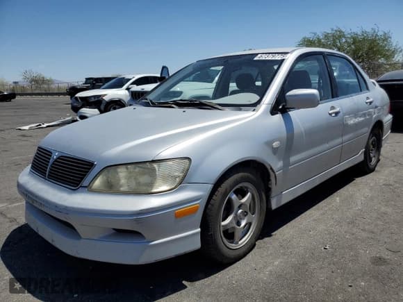 ✅ 2002 Mitsubishi Lancer OZ-Rally • VIN: JA3AJ86E12U057563 • Lot: 67379775. Listed on Copart with 187,217 mi. Free auction sales archive from the USA and detailed vehicle history report at DreamBid. Image 1.