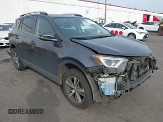 ✅ 2018 Toyota RAV4 XLE • VIN: JTMRFREV2JJ231749 • Лот: 43599708. Опубликован ранее на IAAI с пробегом 103 224 миль. Бесплатный доступ к архиву аукционных продаж из США и подробный отчёт об истории автомобиля на DreamBid. Изображение 1.