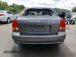 2005 Hyundai Accent GLS z VIN KMHCG45C45U645068, wystawiony jako Copart lot #63000715 z przebiegiem 205 762 mil mil oraz Nie do naprawy • Non repairable. Historia ofert i sprzedaży dostępna na DreamBid. Obrazek 6.