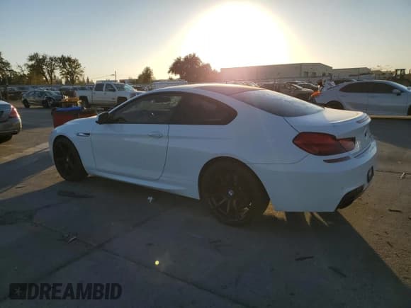 ✅ 2013 BMW 6 Series 650i • VIN: WBAYM9C59DDW20361 • Лот: 79741594. Опубликован ранее на Copart с пробегом 86 948 миль. Бесплатный доступ к архиву аукционных продаж из США и подробный отчёт об истории автомобиля на DreamBid. Изображение 2.