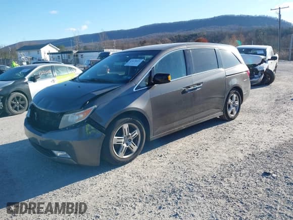 ✅ 2012 Honda Odyssey Touring • VIN: 5FNRL5H93CB037791 • Лот: 43678831. Опубликован ранее на IAAI с пробегом 241 470 миль. Бесплатный доступ к архиву аукционных продаж из США и подробный отчёт об истории автомобиля на DreamBid. Изображение 2.