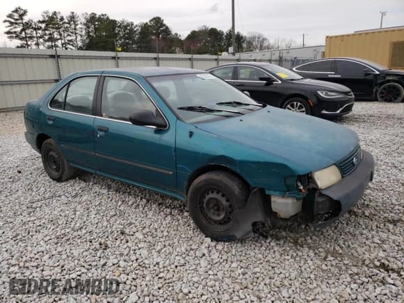 ✅ 1997 Nissan Sentra XE • VIN: 1N4AB41D5VC701930 • Lot: 47263305. Wystawiony na Copart z przebiegiem 156 982 mil. Bezpłatny archiwum sprzedaży aukcyjnych z USA i szczegółowy raport historii pojazdu na DreamBid. Zdjęcie 4.