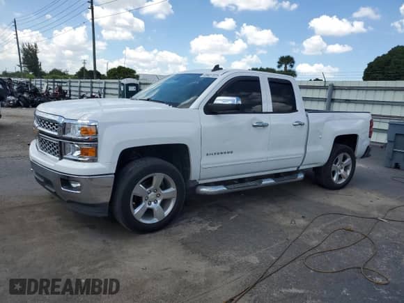 2015 Chevrolet Silverado 1500 LT with VIN 1GCRCREC8FZ362782, listed as a Copart auction lot 69407325 with 34,390 mi miles and Salvage title. Bid and sale history available at DreamBid. Image 1.