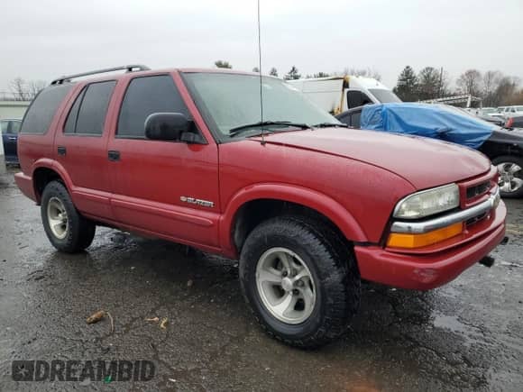 2004 Chevrolet Blazer Fleet z VIN 1GNCS13X64K153392, wystawiony jako Copart lot #83544724 z przebiegiem 169 504 mil mil oraz Szkoda całkowita • Salvage title. Historia ofert i sprzedaży dostępna na DreamBid. Obrazek 4.
